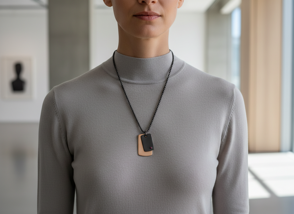 Necklace with tags and natural ruby