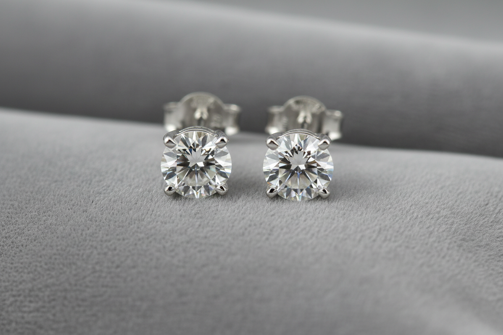 Classic Solitaire diamond earrings with a 4 prong setting
